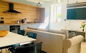 Modern Apartment With Fireplace & Stylish Kitchen